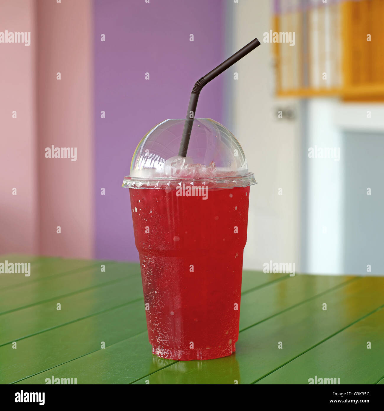 red soda lime juice in takeaway cup Stock Photo Alamy