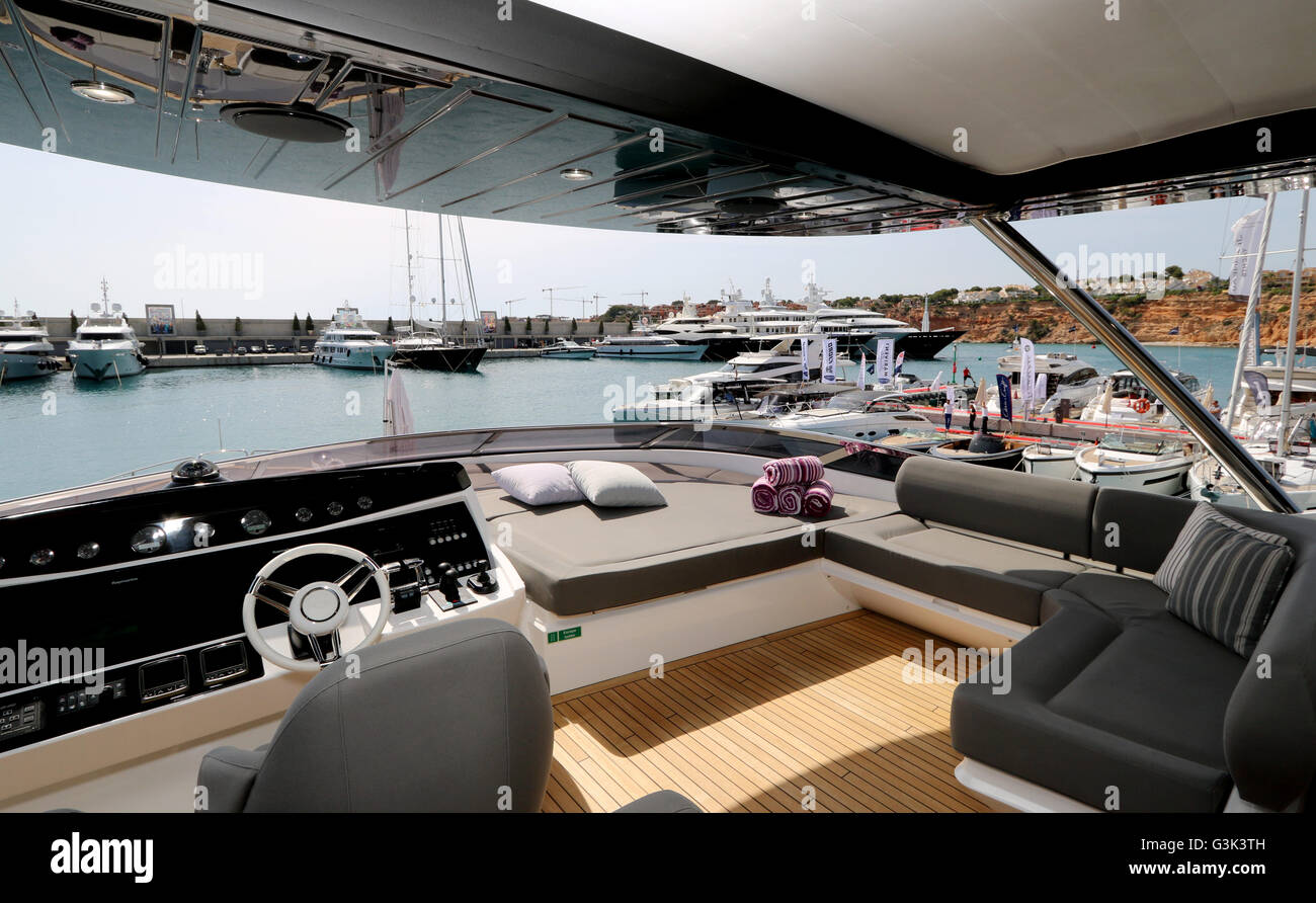 Sunseeker Superyacht 'Autumn' ( 28 mtrs, 8 guests, 20 knots) - flydeck + controls + marina view - Best of Yachting - Port Adrian Stock Photo
