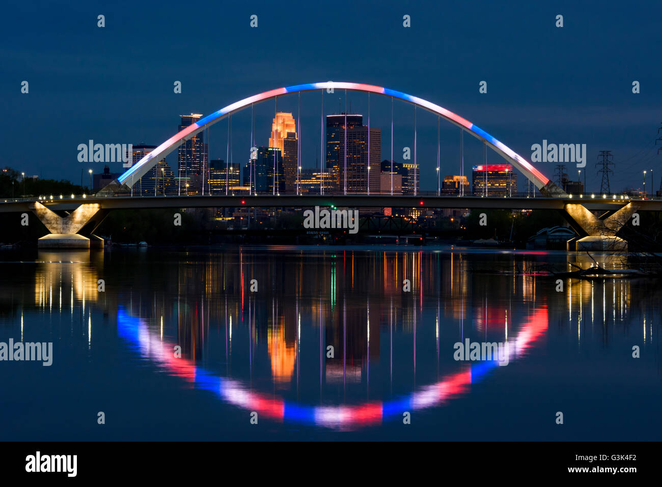 Minneapolis Minnesota skyline seen through the Lowry Avenue bridge at