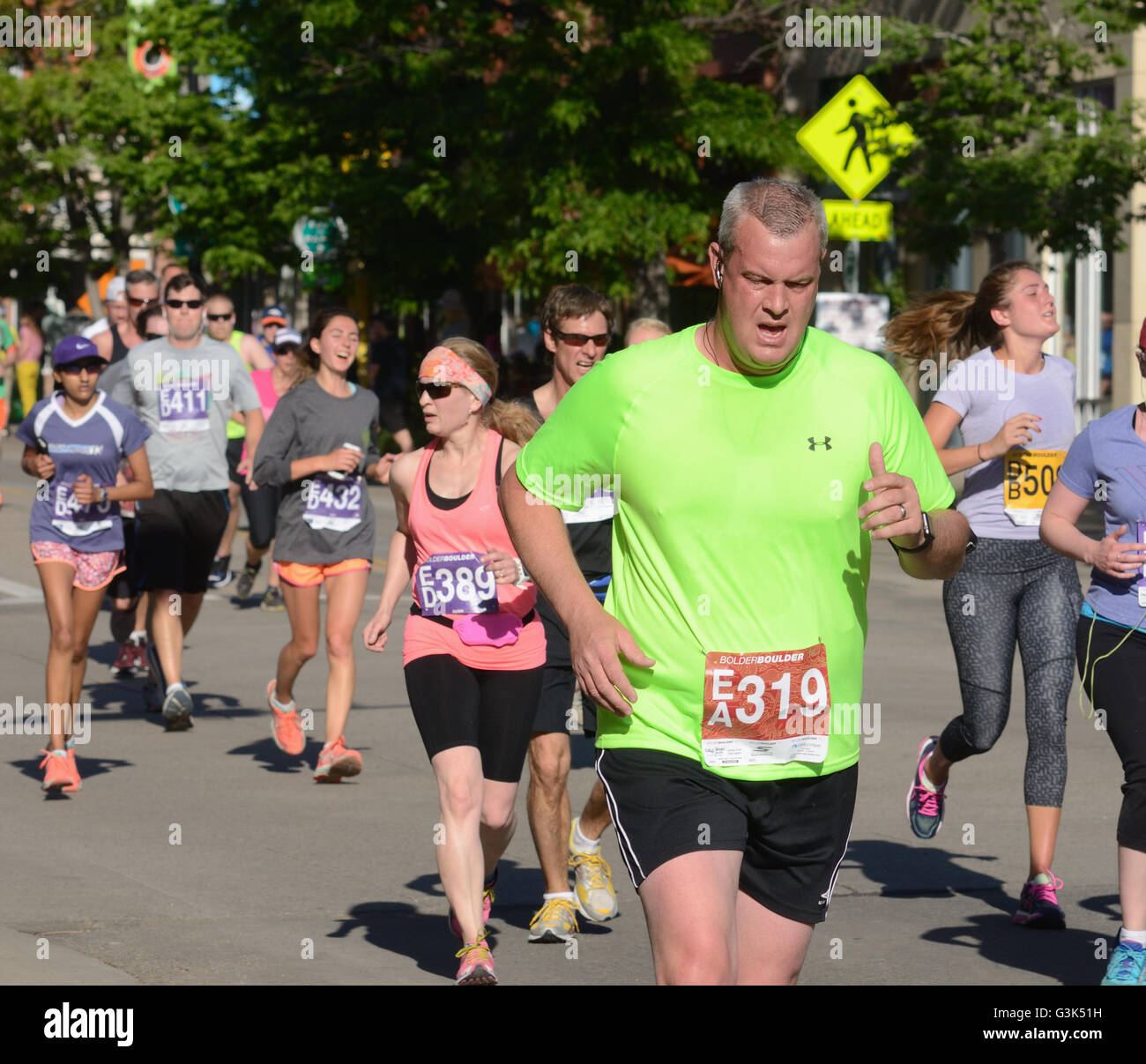 Runners and walkers participate in the 2016 Bolder Boulder 10K. More than 50,000 participate each year. Stock Photo