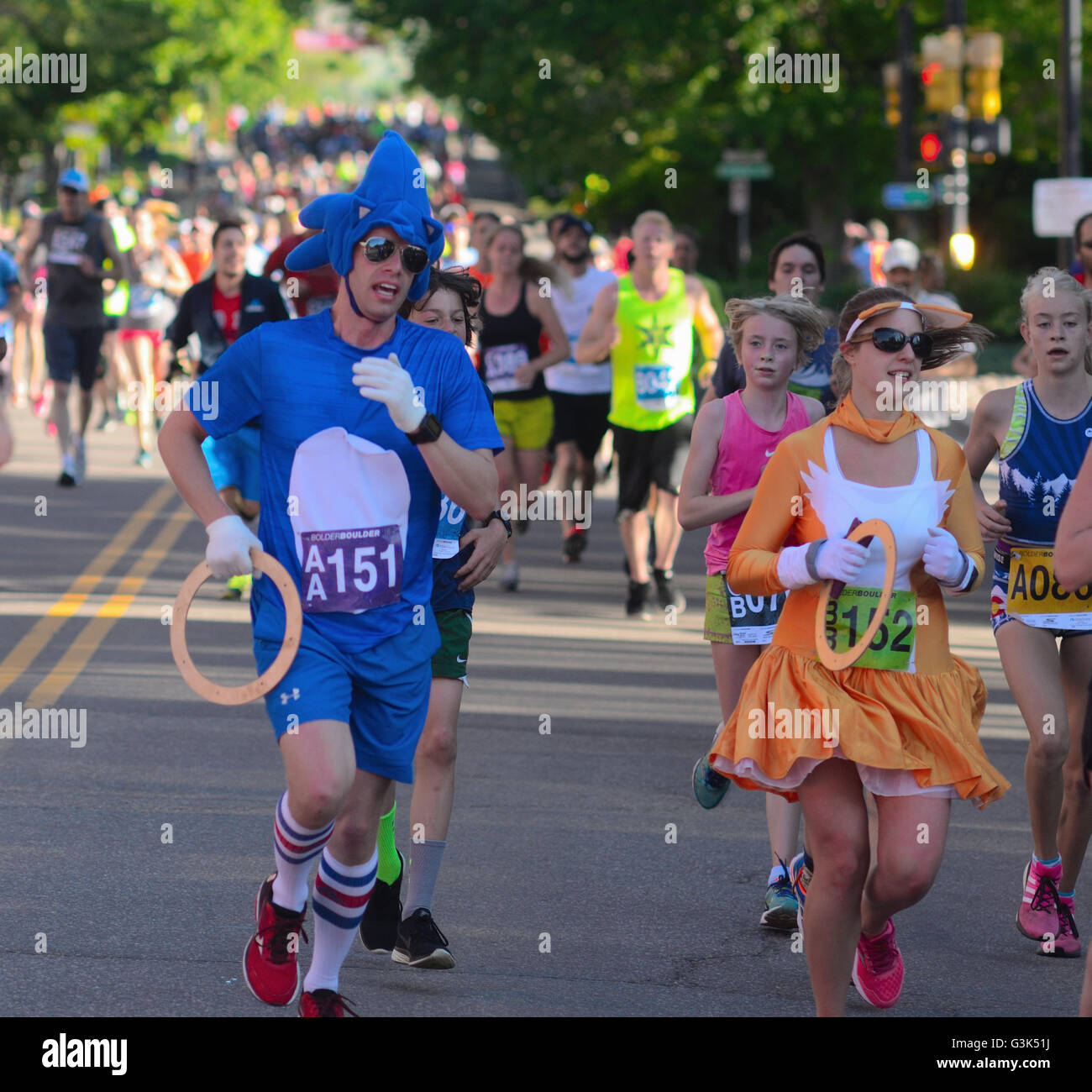 Runners and walkers, some in costumes, participate in the 2016 Bolder