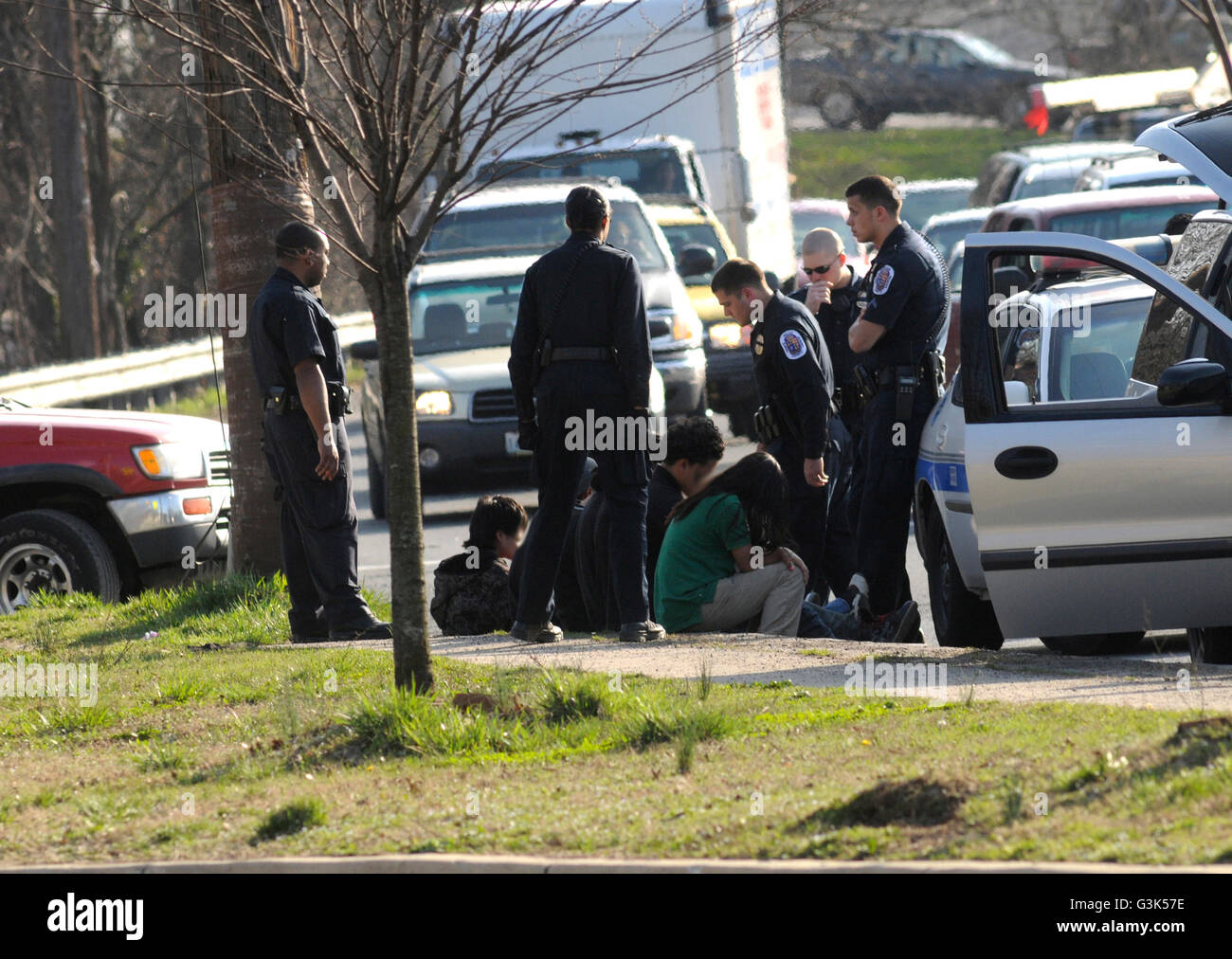 police questions teens ref to a crime in Rogers Heights, Maryland Stock ...