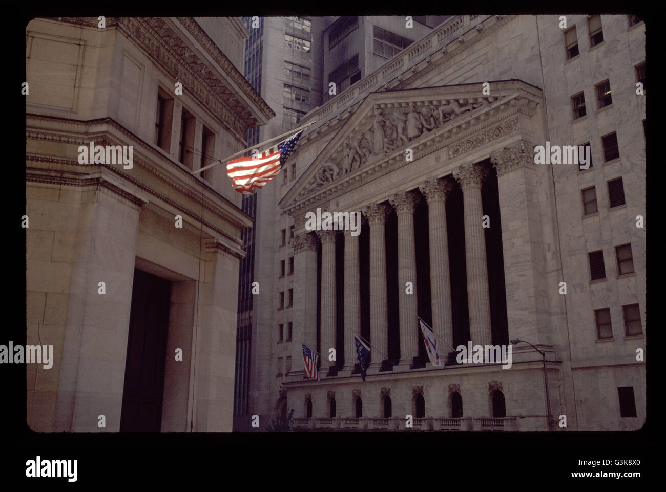 New York Stock Exchange with US flag Stock Photo - Alamy