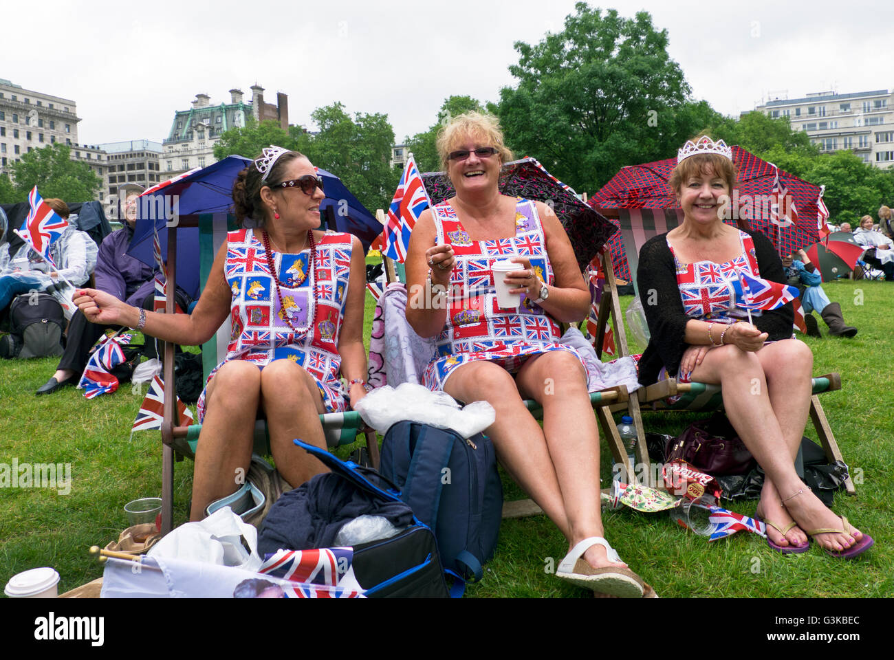 People celebrating Queen Elizabeth's 90th birthday celebrations in St James Park London Stock Photo
