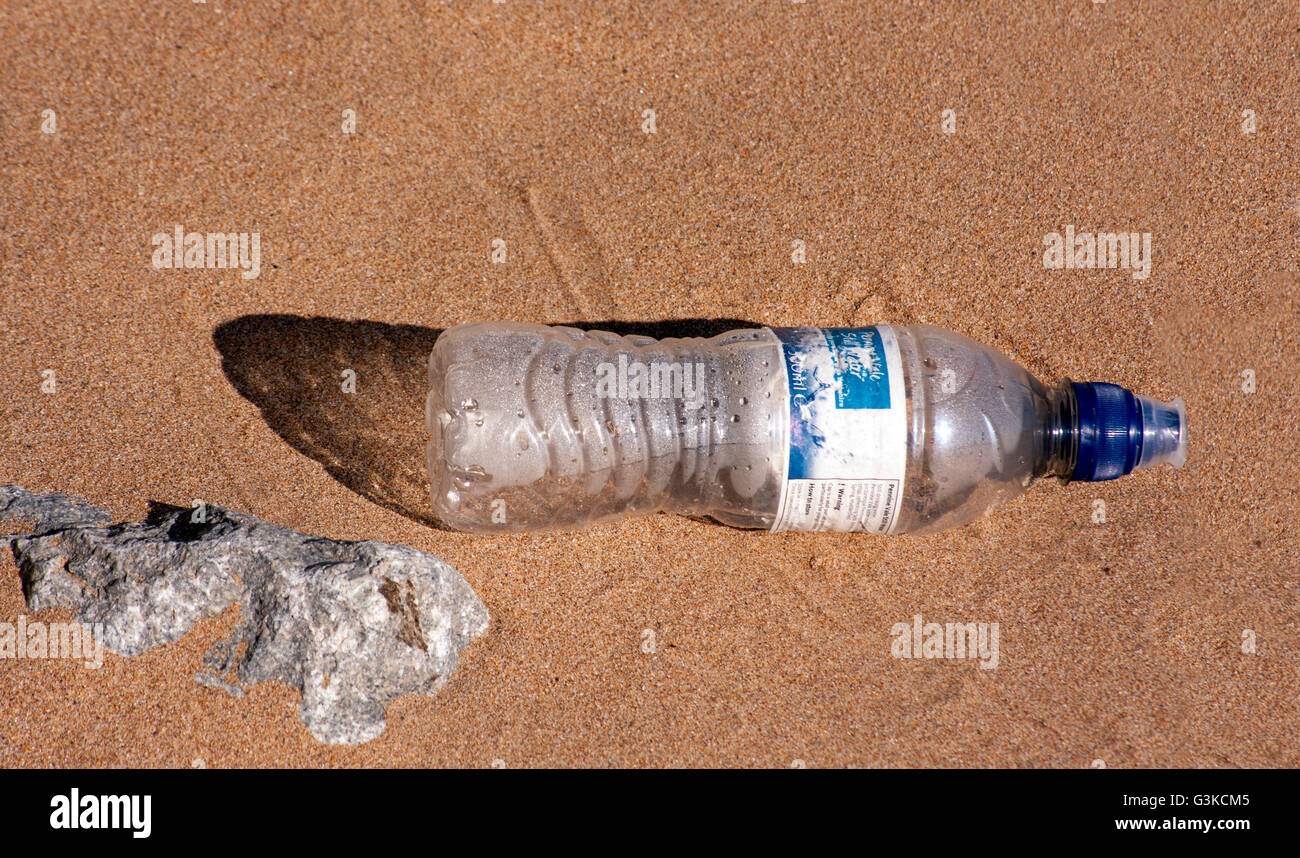 Plastic Water Bottle on a Beach Stock Photo