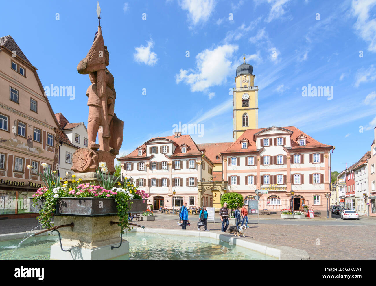 market well with knight on market square with 'twin houses' and Muenster St. Johannes Baptist, Germany, Baden-Württemberg, Taube Stock Photo