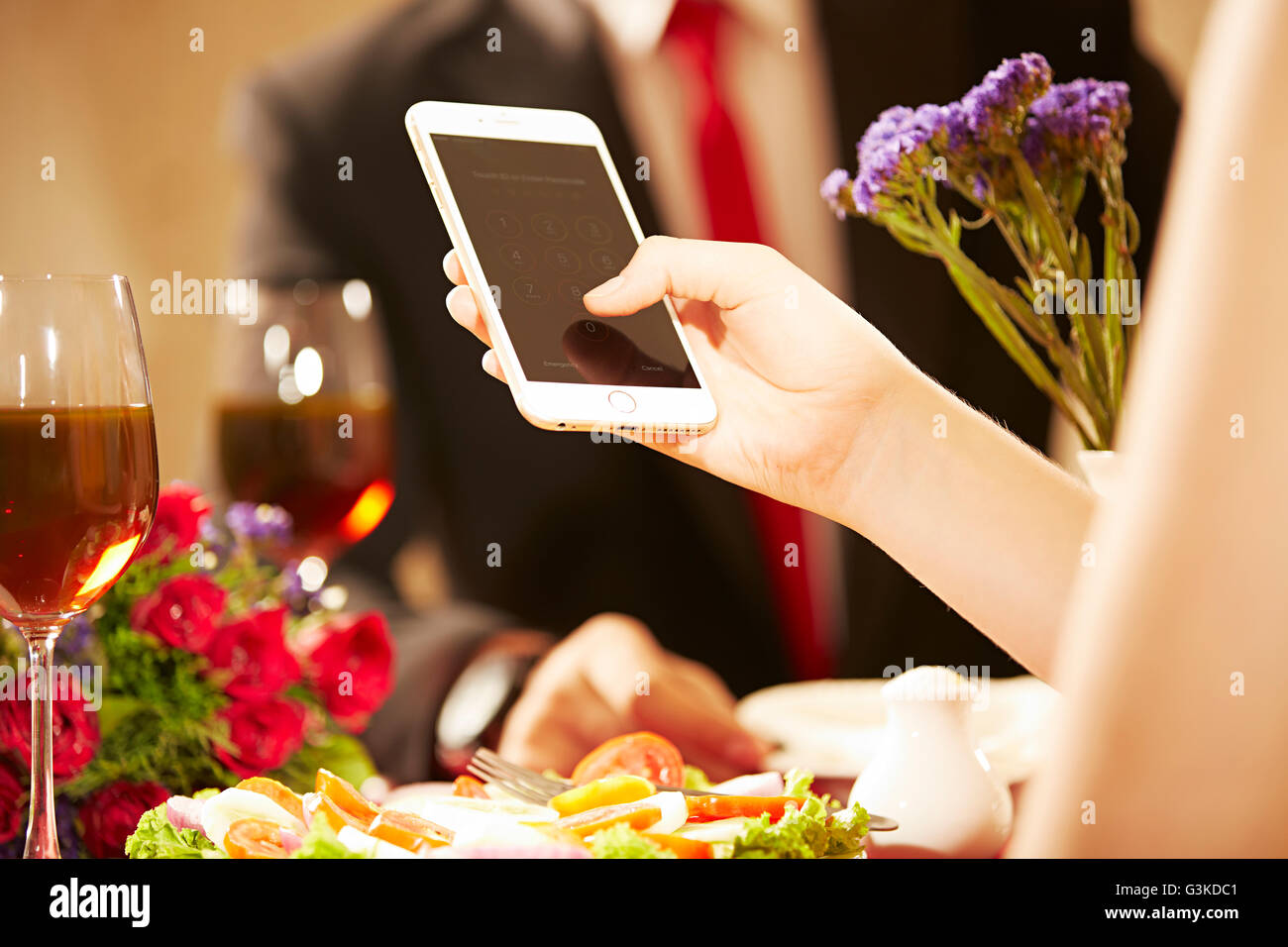 2 Foreigner Married Couples Hotel Dating dialing mobile Phone Stock Photo