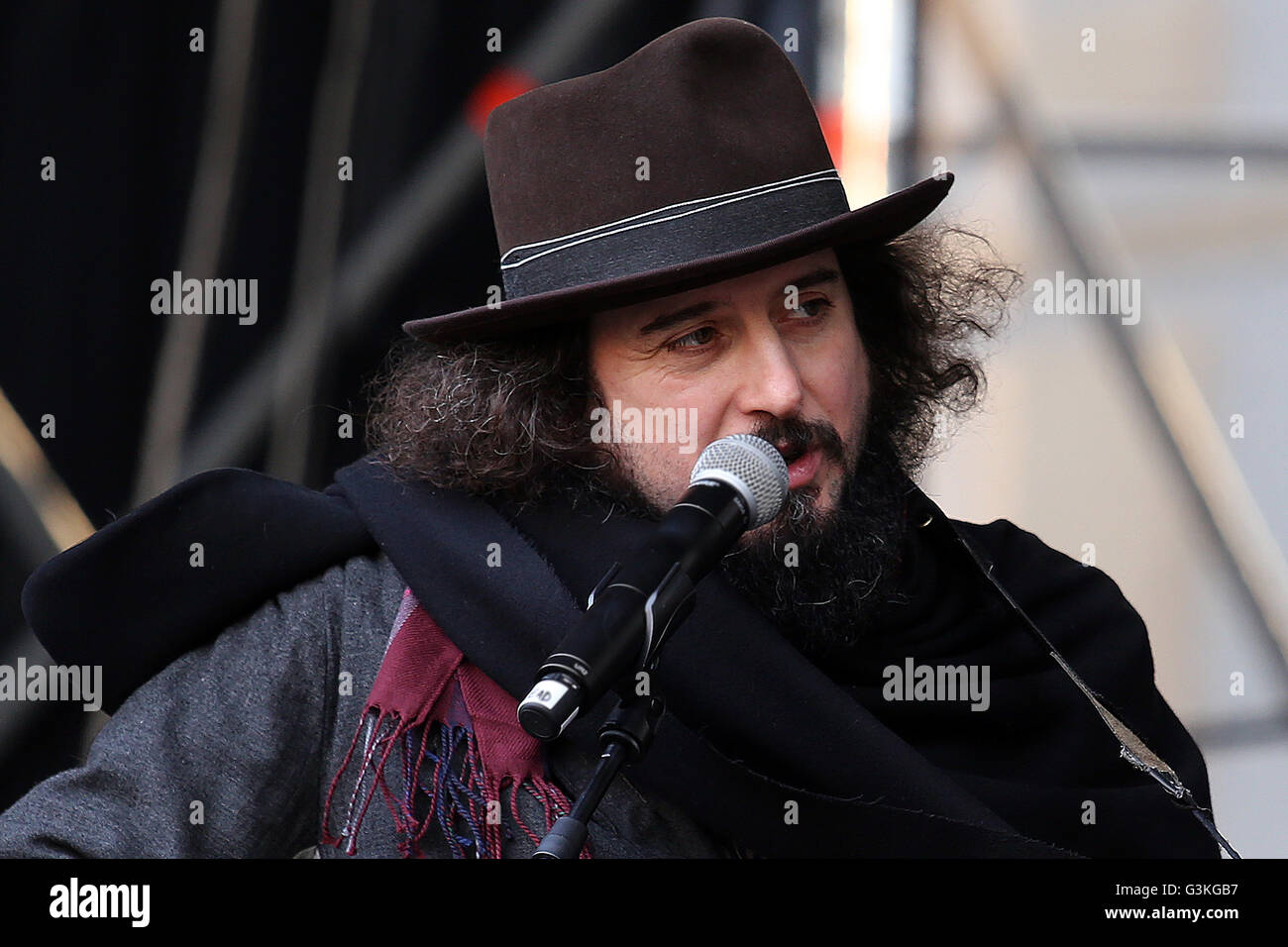 The singer Vinicio Capossela during rehearsals in San Carlo Square in Turin for New Year's concert. Vinicio Capossela is an Italian singer-songwriter. His style is strongly influenced by US singer and songwriter Tom Waits, though it also draws from the traditions of Italian folk music. Stock Photo