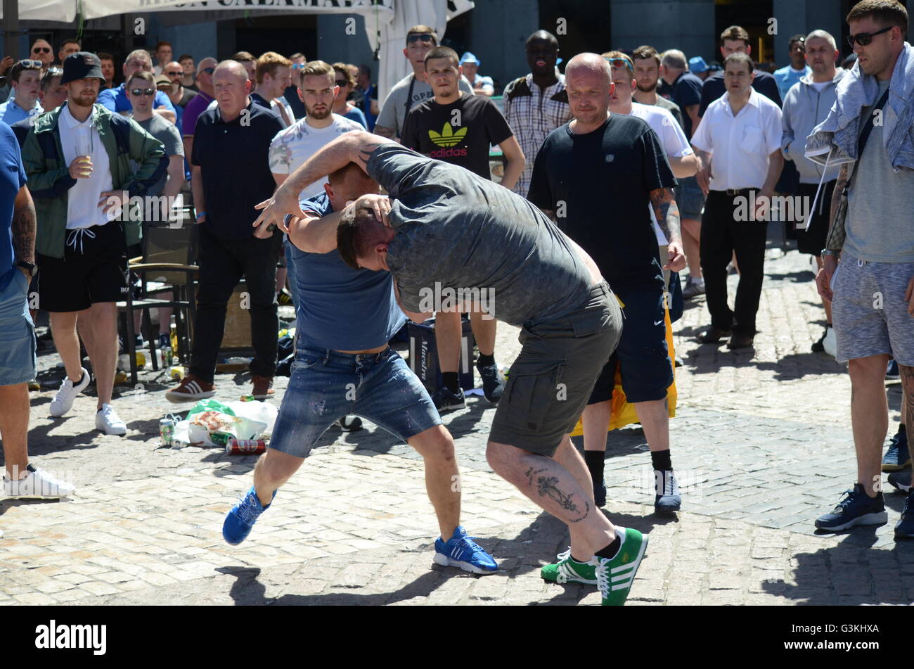 Madrid, Spain. 04th May, 2016. Two Manchester City fans pictured hitting each other in Madrid. Nearly 10,000 Manchester City fans travel to Madrid to watch the semi-final UEFA Champions League match between Real Madrid (Spain) and Manchester City F.C (England). Supporters congregate in the streets around Plaza Mayor in central Madrid prior the game. © Jorge Sanz/Pacific Press/Alamy Live News Stock Photo