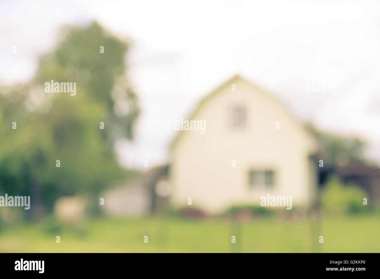 Blurred countrified background with village house Stock Photo