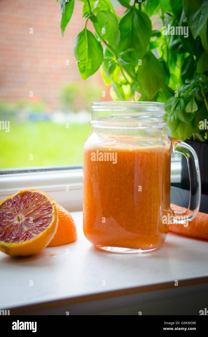 orange and carrot juice, healthy juicing Stock Photo Alamy
