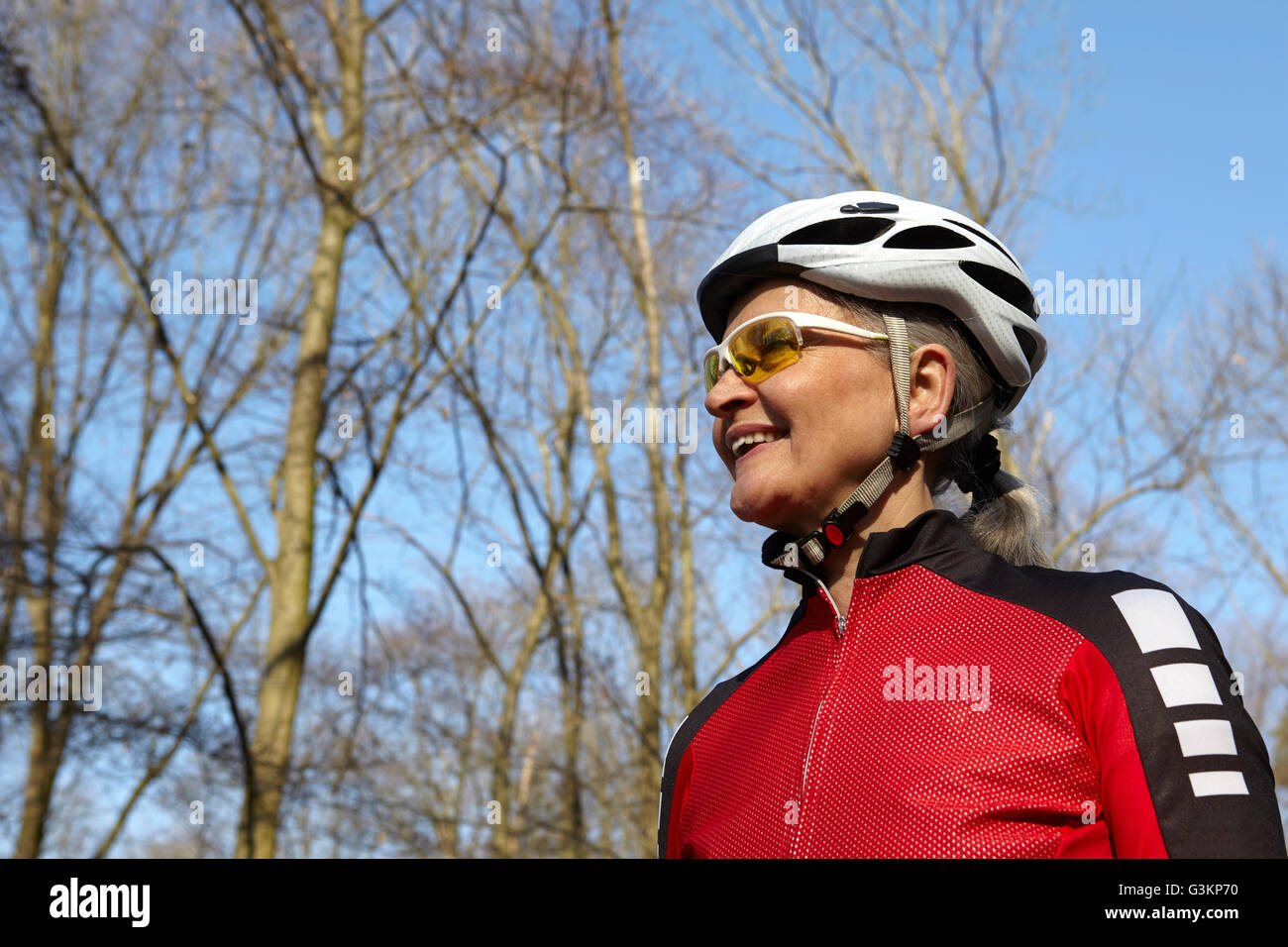 Older woman cycling hi-res stock photography and images - Alamy
