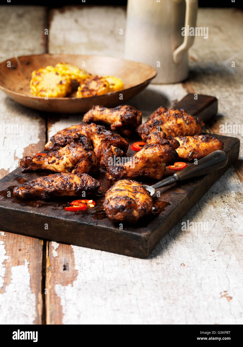 Barbecued peri peri chicken wings Stock Photo