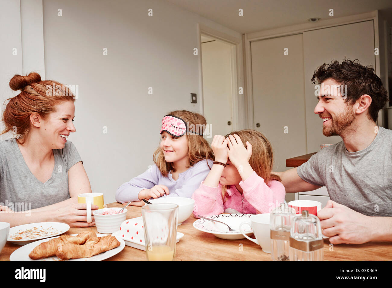 Children covering parents eyes hi-res stock photography and images - Alamy