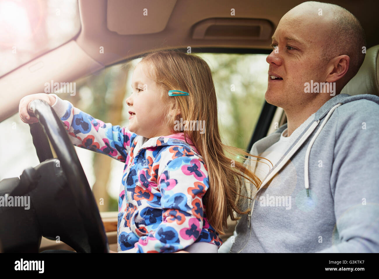 Child car steering wheel parent hi-res stock photography and ima