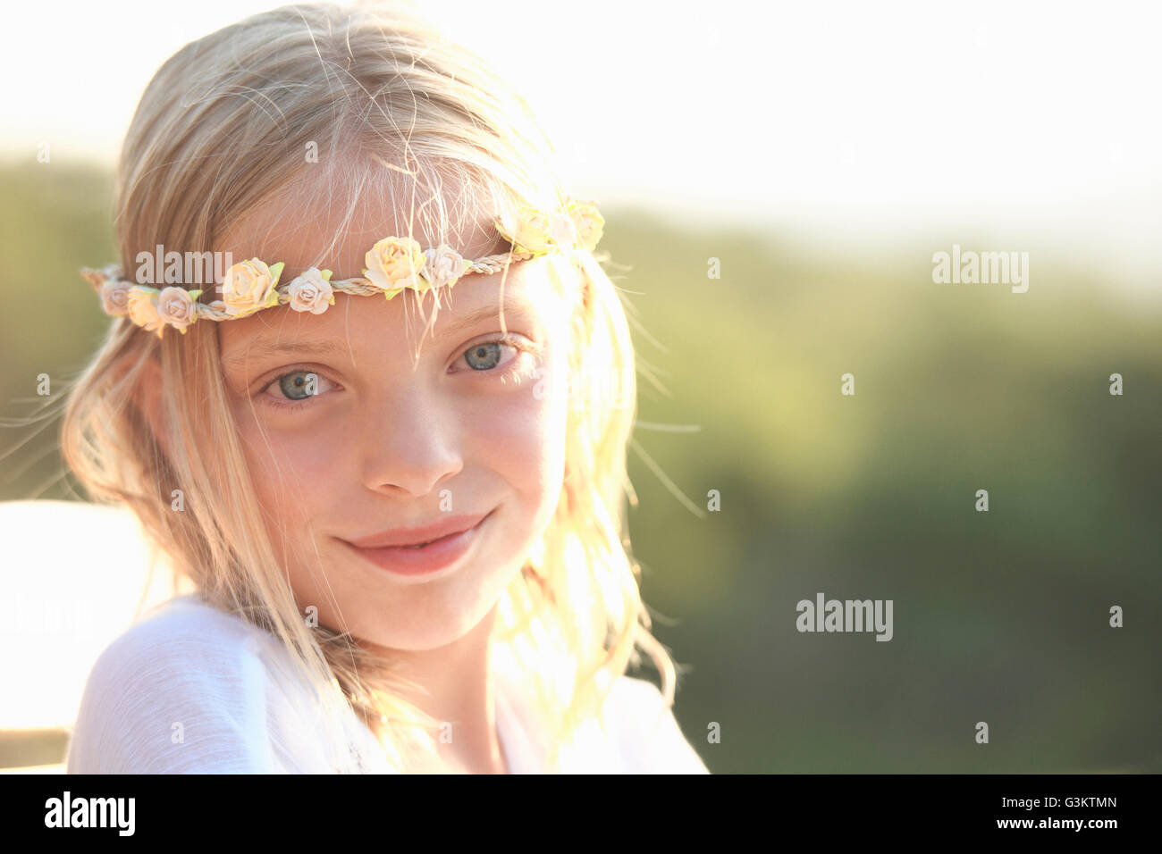 Portrait of blond girl wearing flower headband, Buonconvento, Tuscany, Italy Stock Photo
