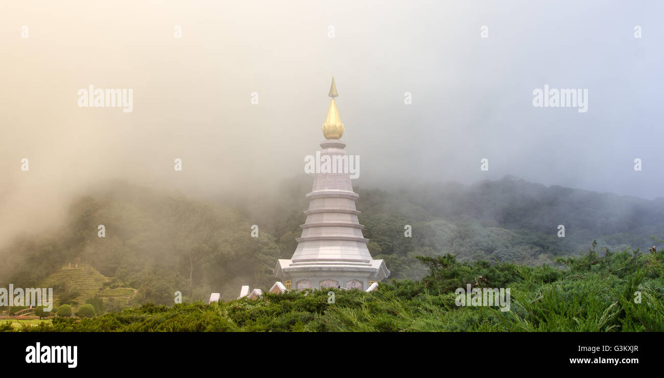 Obelisk in Thailand rainforest, foggy day Stock Photo