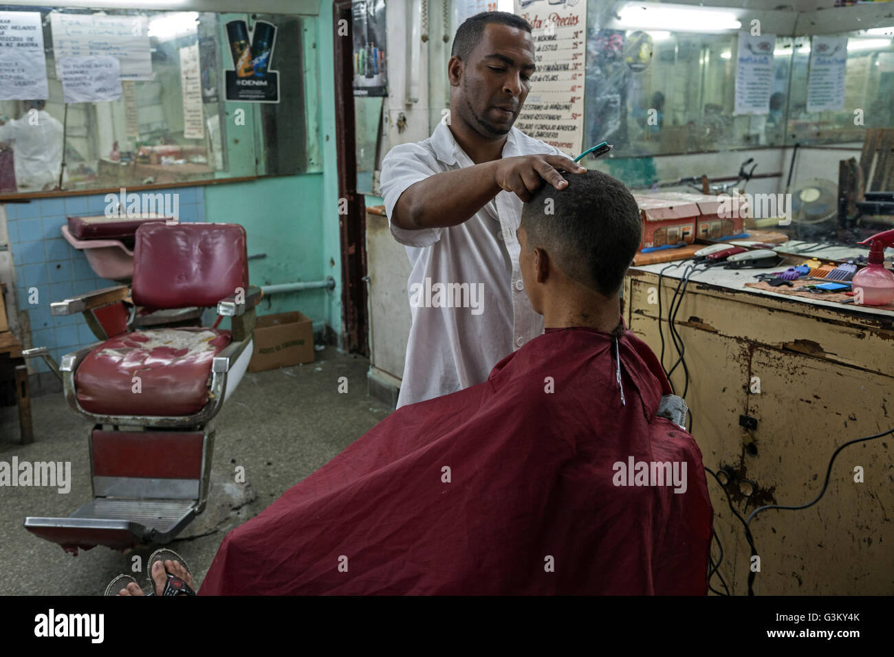 Hair salon, barber cutting hair, historic centre, Havana, Cuba Stock Photo