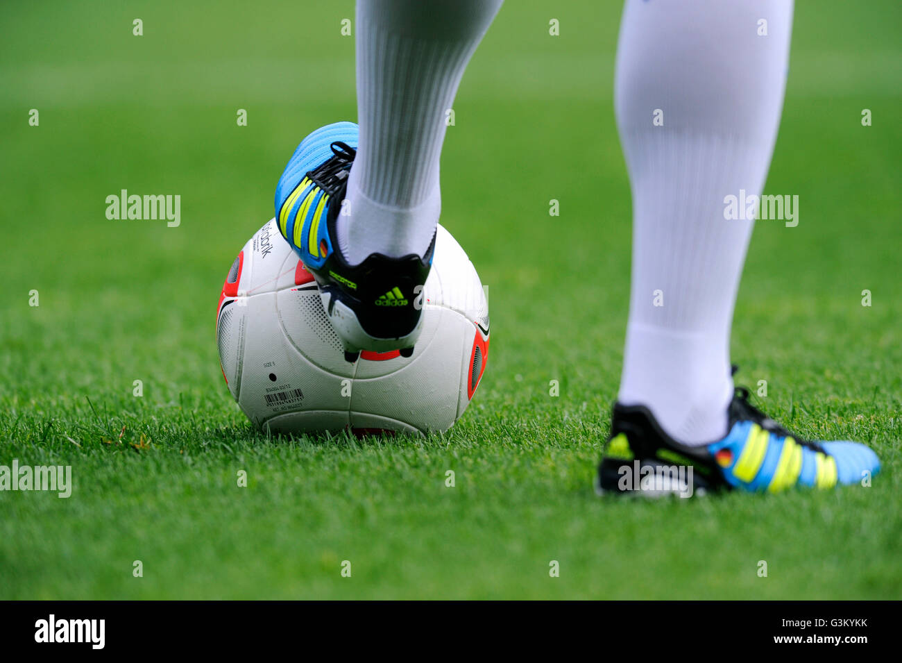 Players legs wearing adidas football boots and the adidas Torfabrik anniversary ball for the 50th Bundesliga season, VfL Bochum Stock Photo