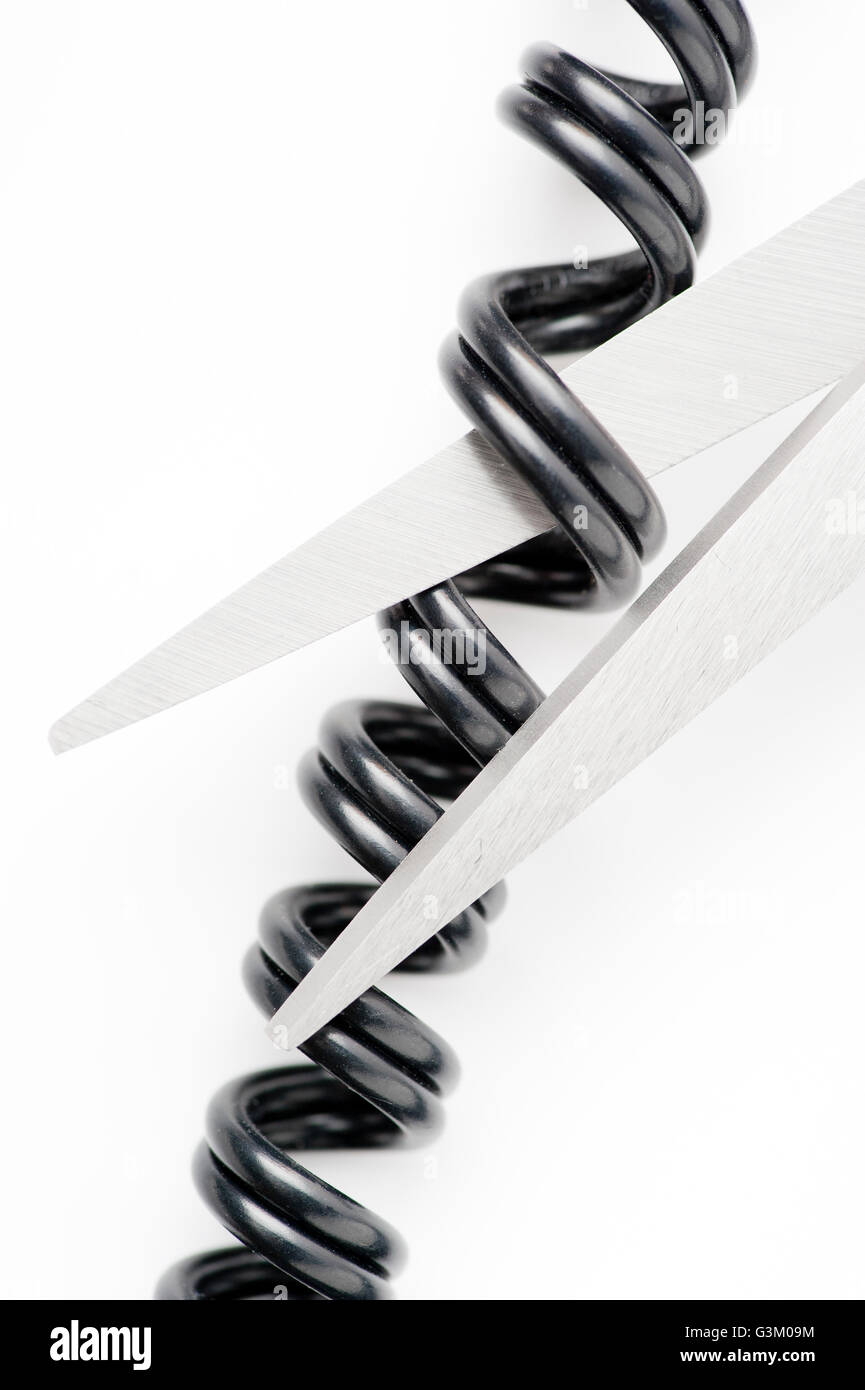 Scissors cutting a telephone cord Stock Photo Alamy