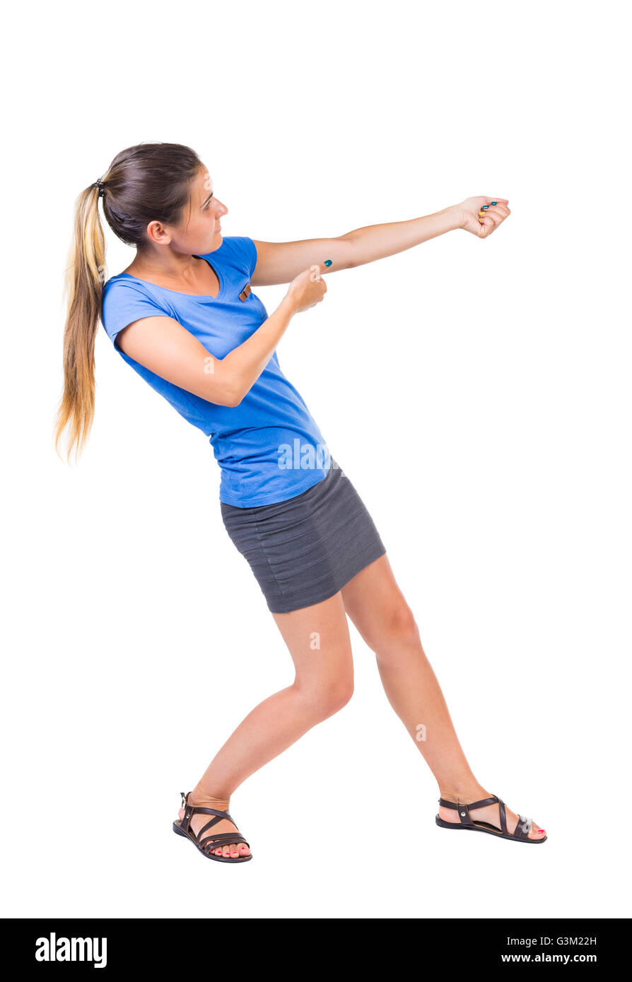Woman pulling something heavy Cut Out Stock Images & Pictures - Alamy