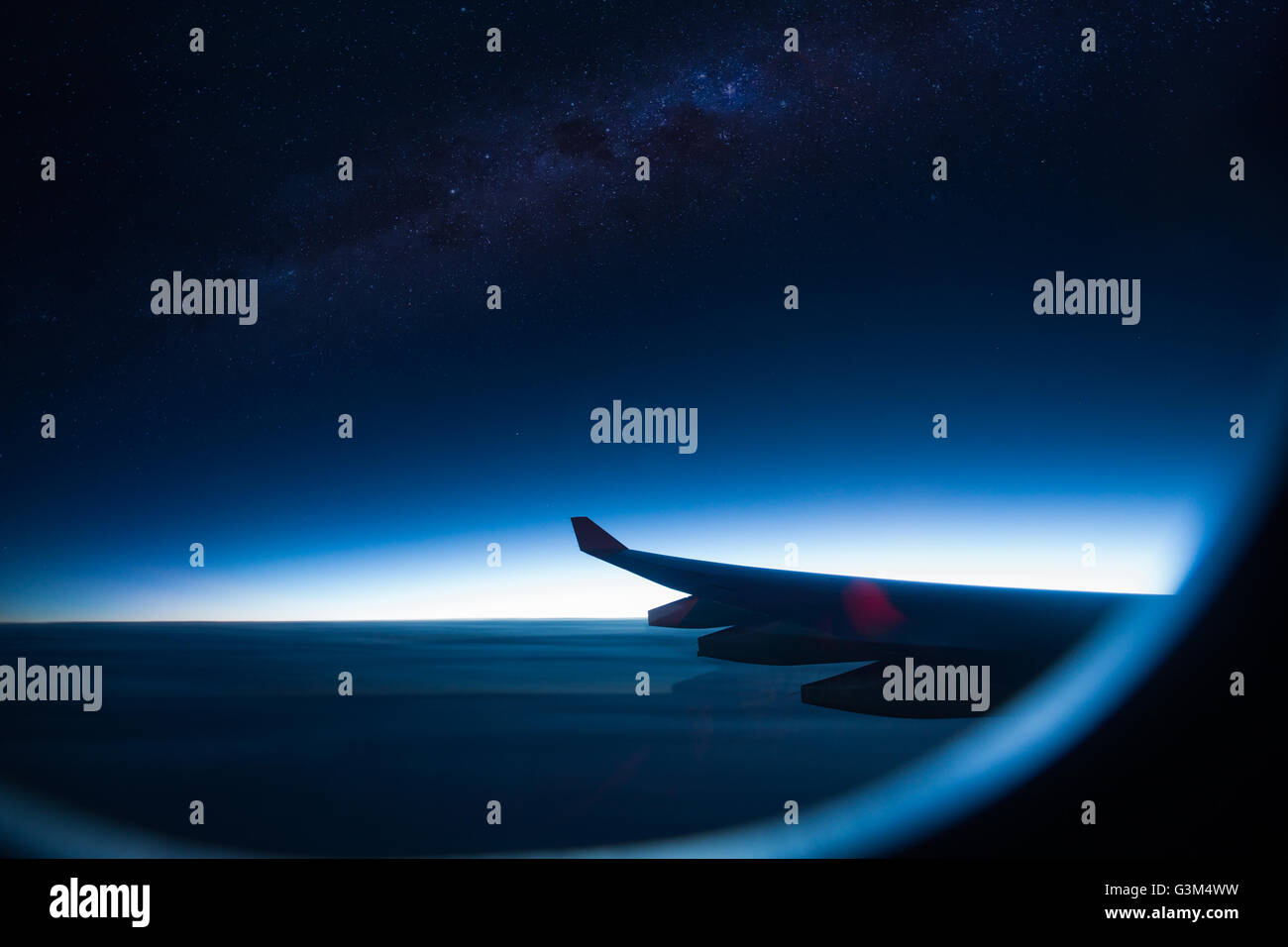 Airplane window lookout Stock Photo - Alamy