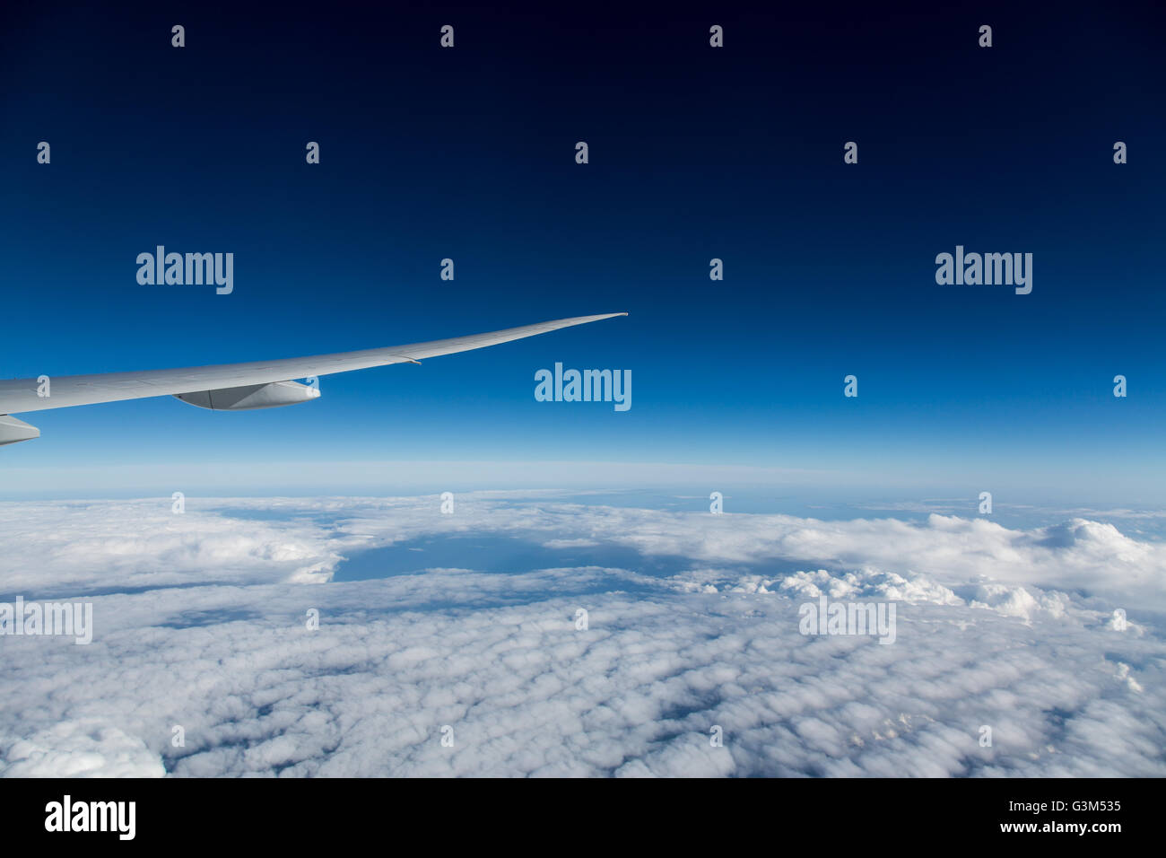 Airplane window lookout Stock Photo - Alamy