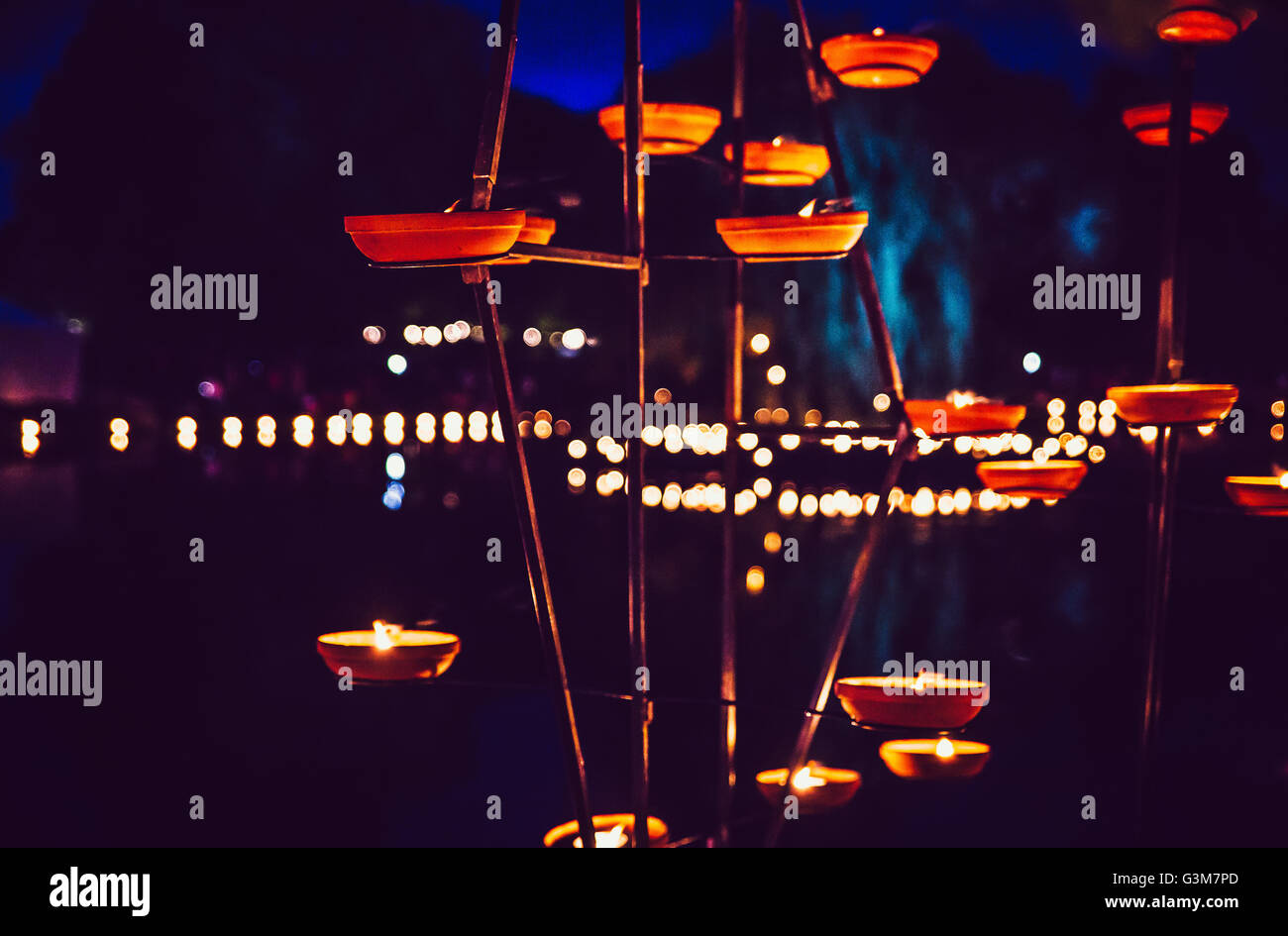 candle flames glowing in dark Stock Photo Alamy
