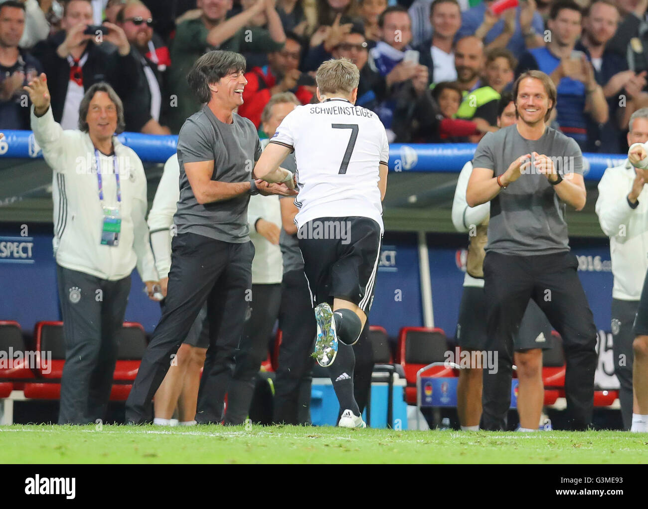 Lillie, France. 12th June, 2016. Bastian SCHWEINSTEIGER, DFB 7  celebrates  celebration, his goal with  DFB coach Joachim Jogi LOEW, LÖW, and Thomas SCHNEIDER, DFB , assistent coach GERMANY - UKRAINE 2-0  Group C, Football European Championships at 12th June 2016 in Lille,France. Credit:  Peter Schatz / Alamy Live News Stock Photo