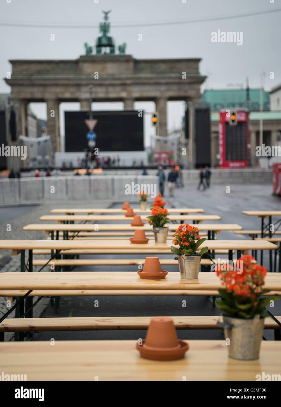 Berlin, Germany. 13th June, 2016. Empty tables are seen at the so called 'Fanmeile' (Supporters mile), where the public screenings of UEFA European Championship matches take place, in Berlin, Germany, 13 June 2016. Photo: Sophia Kembowski/dpa/Alamy Live News Stock Photo