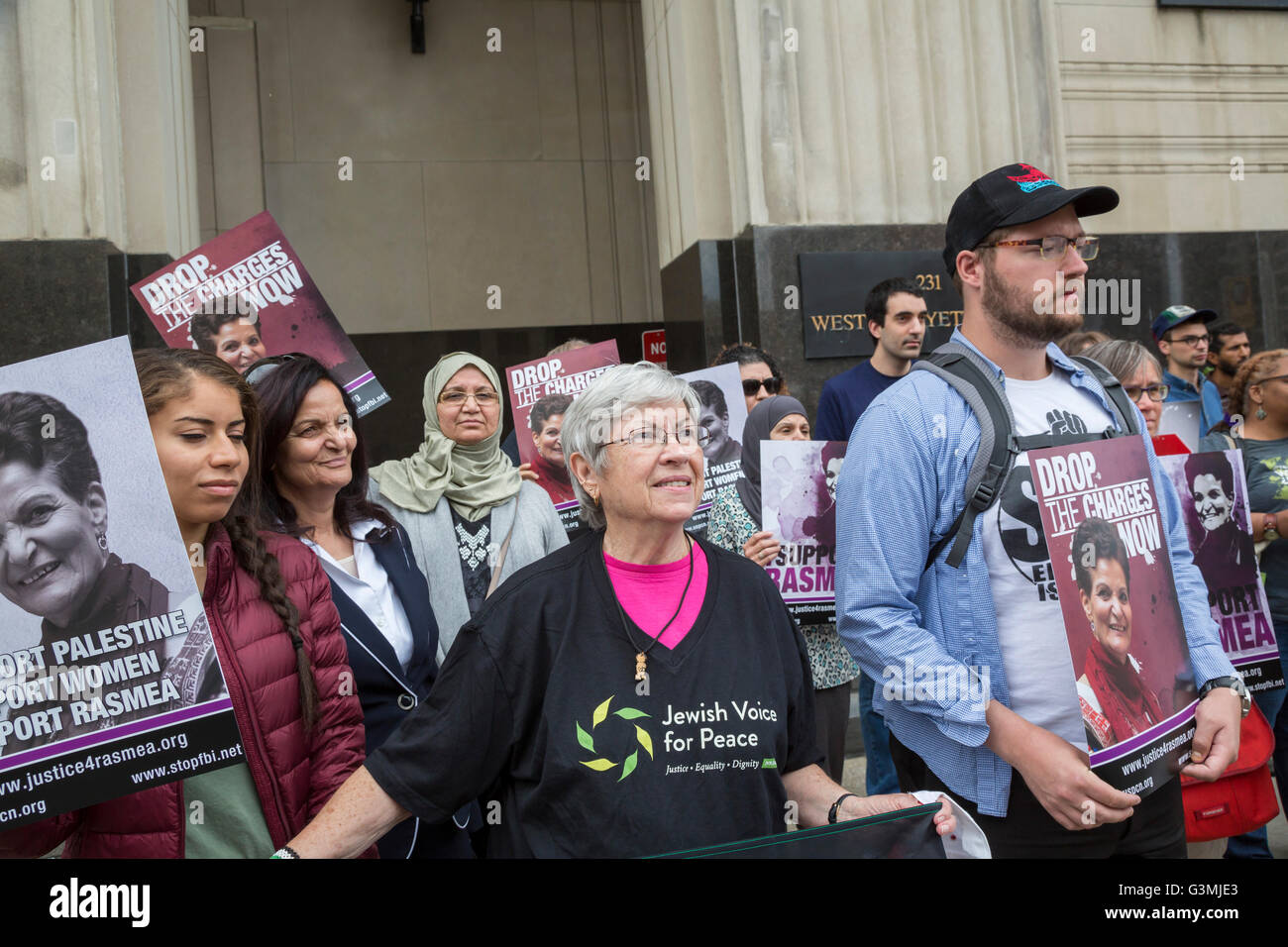 Detroit, Michigan, USA. 13th June, 2016. Supporters of Palestinian-American activist Rasmea Odeh (second from left) rallied outside a Federal Courthouse where a federal judge held a status conference on her request for a new trial. In 2015, Odeh was convicted of lying on her 2004 application for U.S. citizenship. But a federal appeals court ordered Judge Gershwin Drain to reconsider the case because he had improperly excluded testimony about Odeh's torture in an Israeli prison. Credit:  Jim West/Alamy Live News Stock Photo