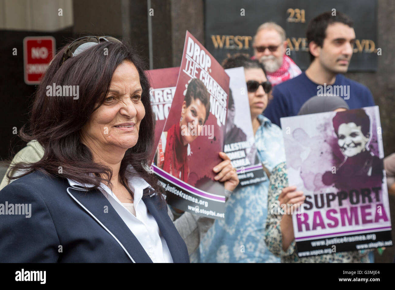 Detroit, Michigan, USA. 13th June, 2016. Supporters of Palestinian-American activist Rasmea Odeh (left) rallied outside a Federal Courthouse where a federal judge held a status conference on her request for a new trial. In 2015, Odeh was convicted of lying on her 2004 application for U.S. citizenship. But a federal appeals court ordered Judge Gershwin Drain to reconsider the case because he had improperly excluded testimony about Odeh's torture in an Israeli prison. Credit:  Jim West/Alamy Live News Stock Photo