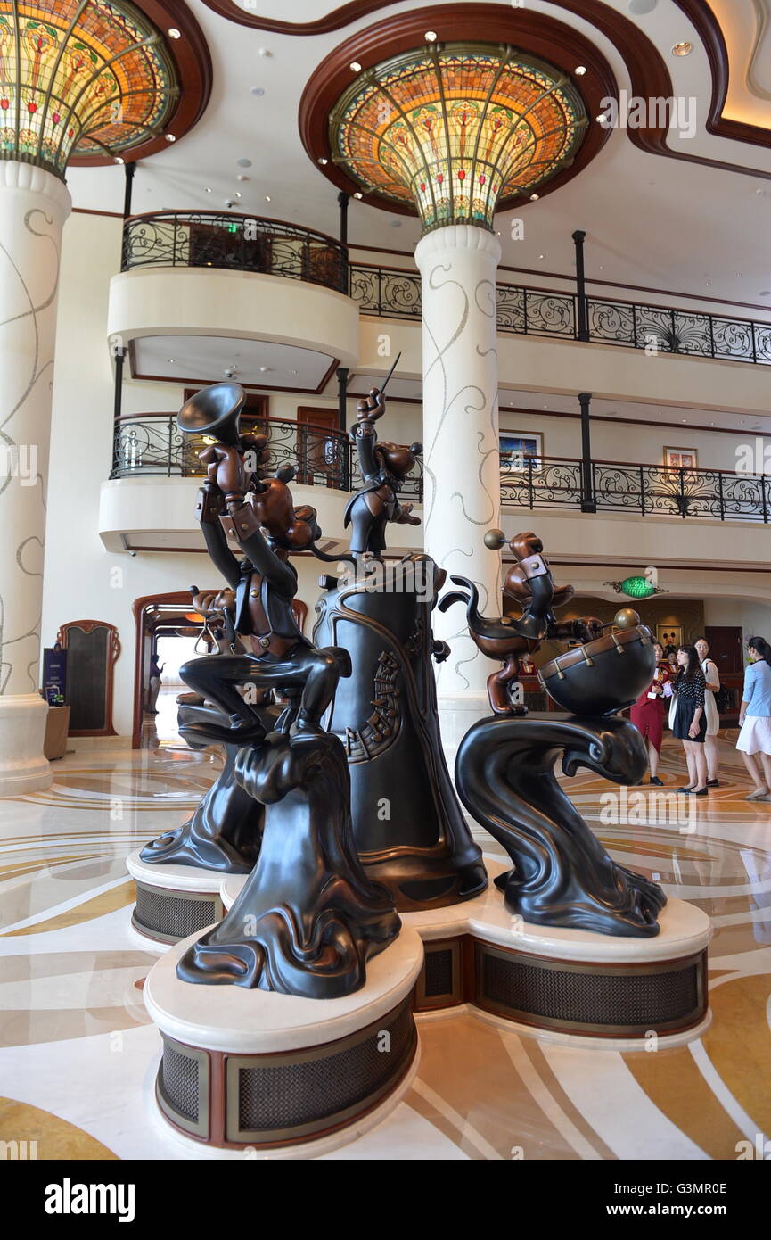 Shanghai. 14th June, 2016. Photo taken on June 14, 2016 shows the bronze statues of Disney characters in the Shanghai Disneyland Hotel in Shanghai, east China. The Shanghai Disney Resort, the sixth in the world, will officially open on June 16. Credit:  Liu Xiaojing/Xinhua/Alamy Live News Stock Photo