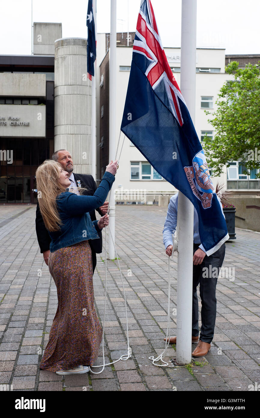 the falklands flag is raised at a flag raising ceremony marking the 34th anniversary of the end of the falklands war portsmouth uk Stock Photo