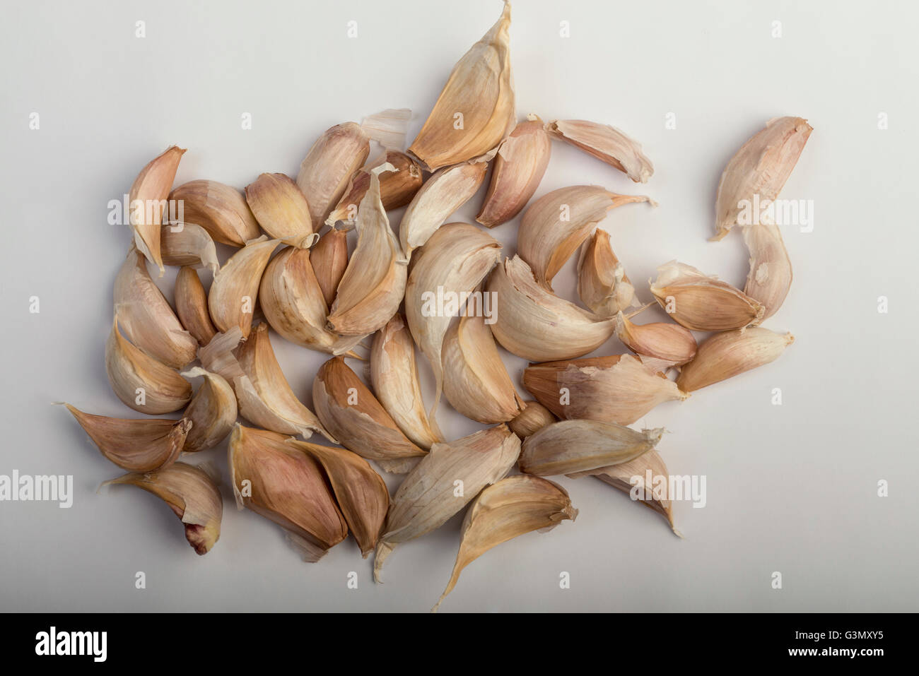 Fresh garlic on white background Stock Photo - Alamy
