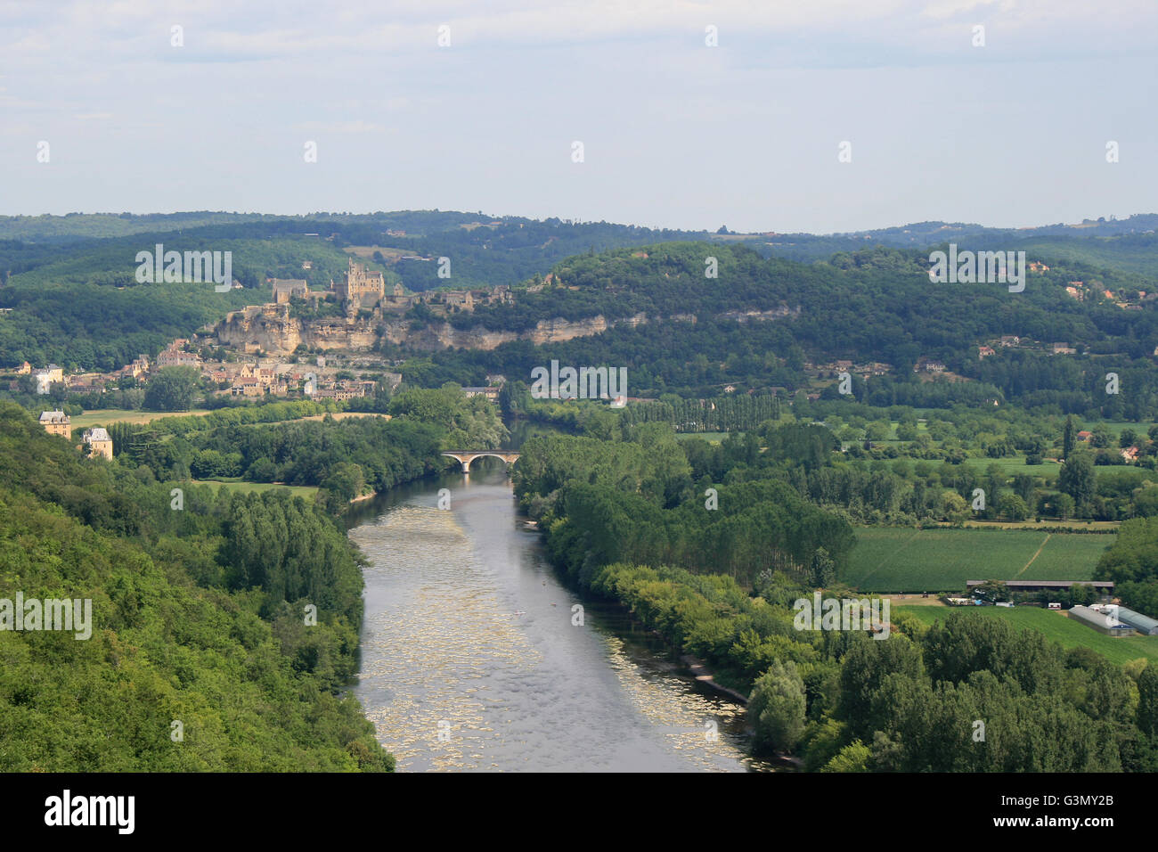 Landscape in Dordogne (France) with river, forest and medieval village ...