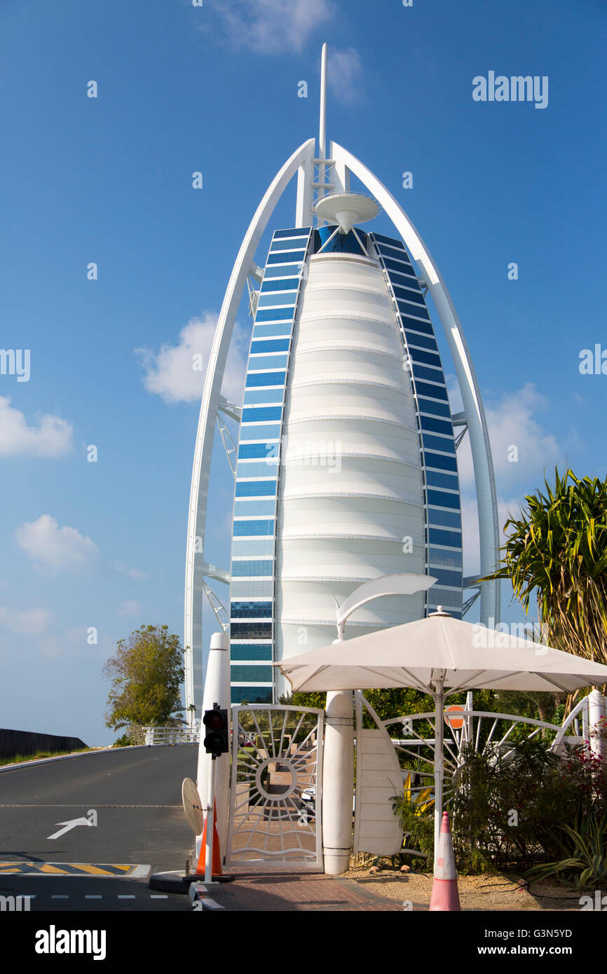 DUBAI, UAE - JANUARY 16, 2014: Burj Al Arab hotel in Dubai. The complex stands on an artificial island and is connected to the m Stock Photo