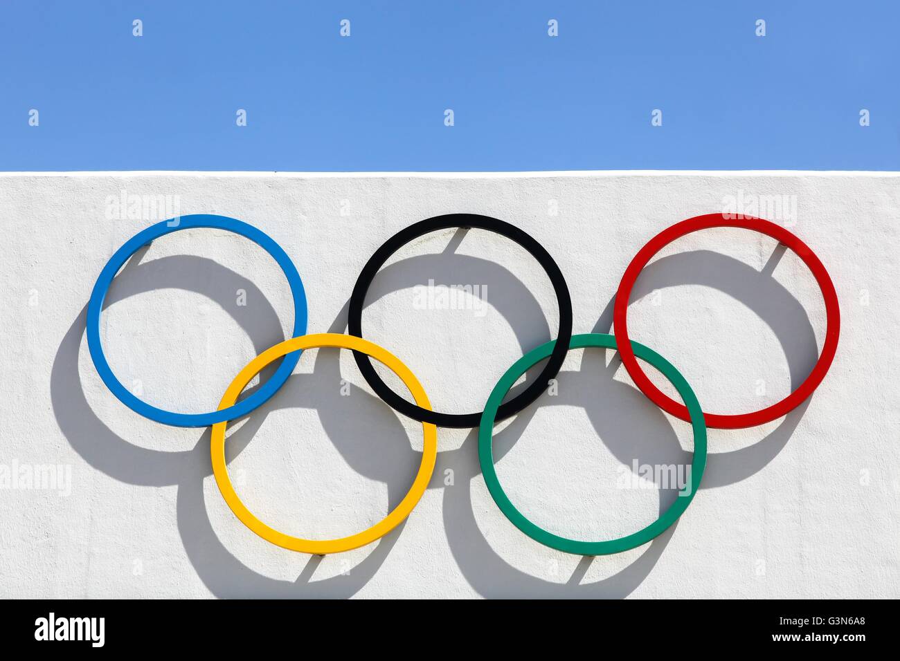 Olympic rings on a wall Stock Photo