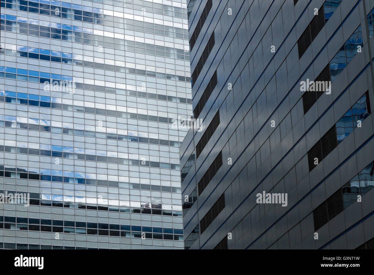 View of Steel and glass skyscrapers intersect with sky reflection Stock Photo ...