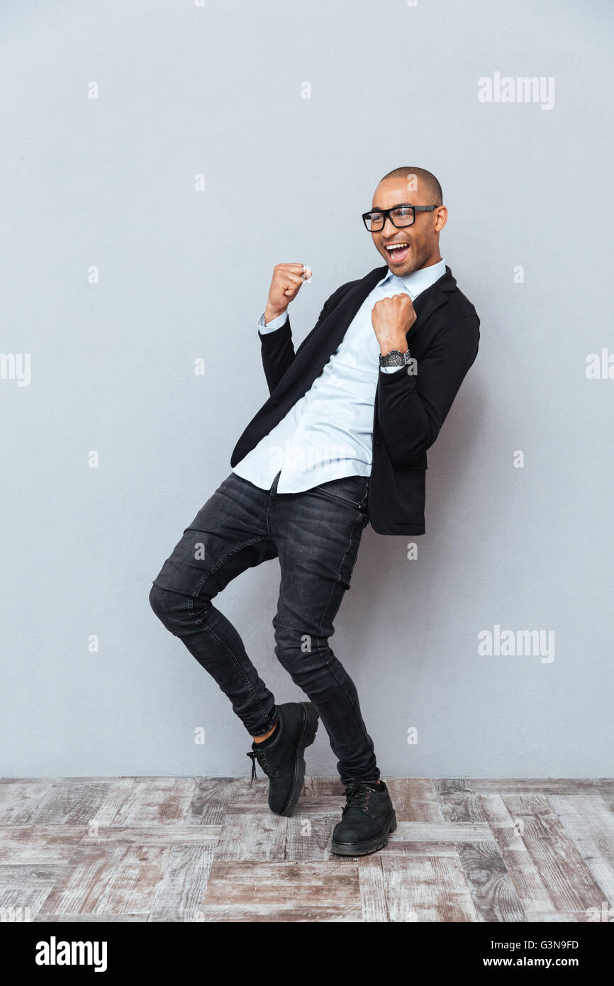 Kneeling man celebrating hi-res stock photography and images - Alamy