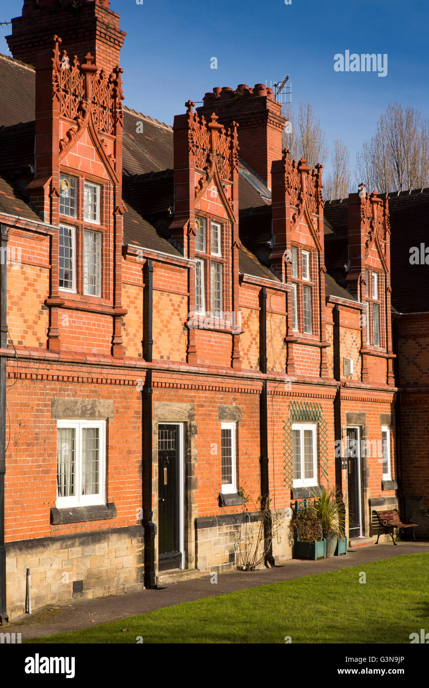 UK, England, Wirrall, Port Sunlight, Cross Street, houses with moulded