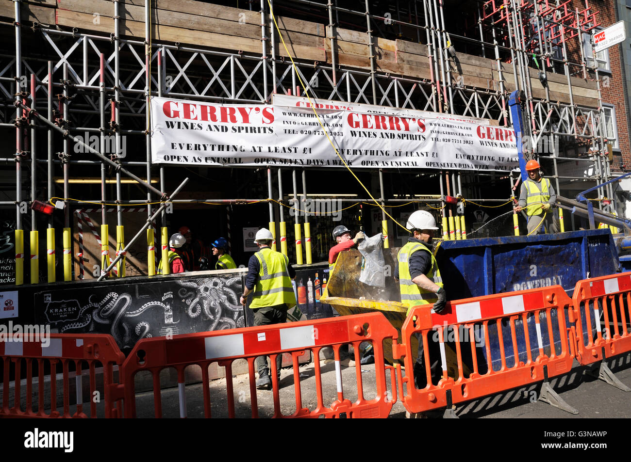 Workmen on a scaffolding site in Old Compton Street, Soho, London, England, UK Stock Photo