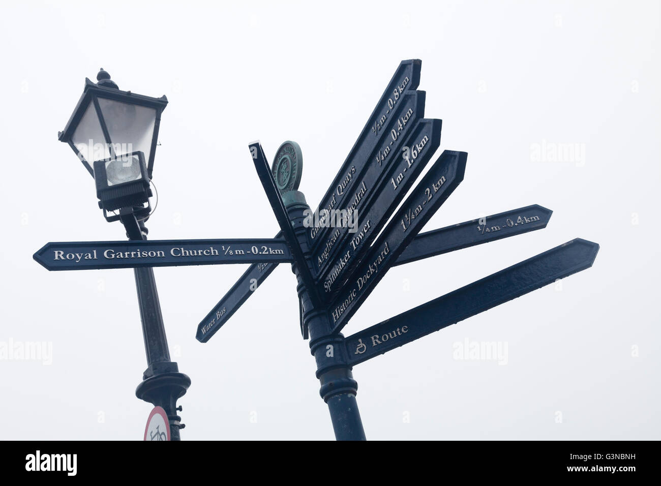 Local sights opd portsmouth sign post with street lamp Stock Photo