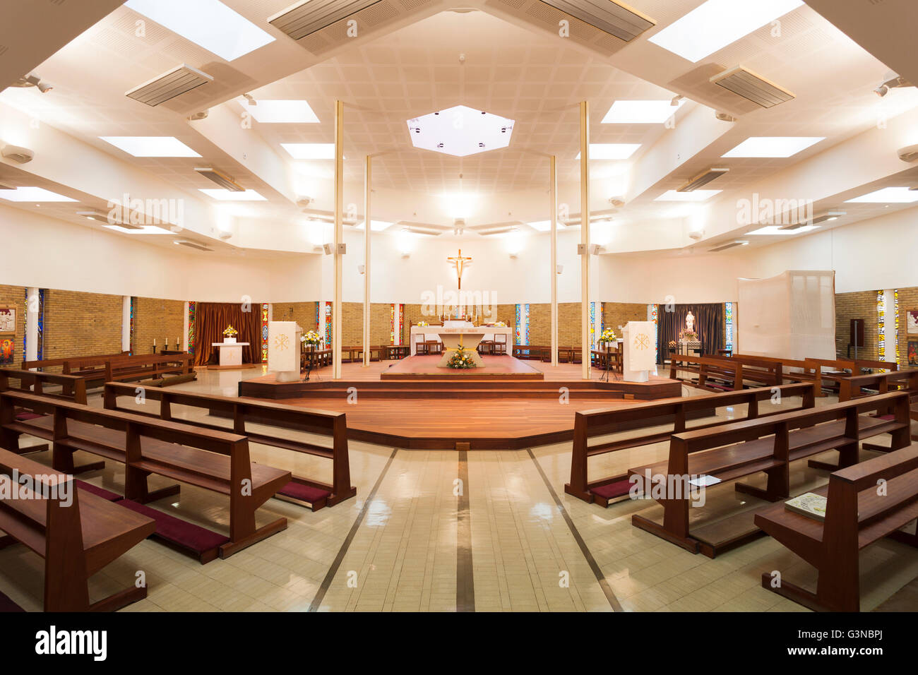 Interior of modern catholic church with pews and altar, St Mary's Church in Alton, Hampshire, England, United Kingdom, Europe Stock Photo