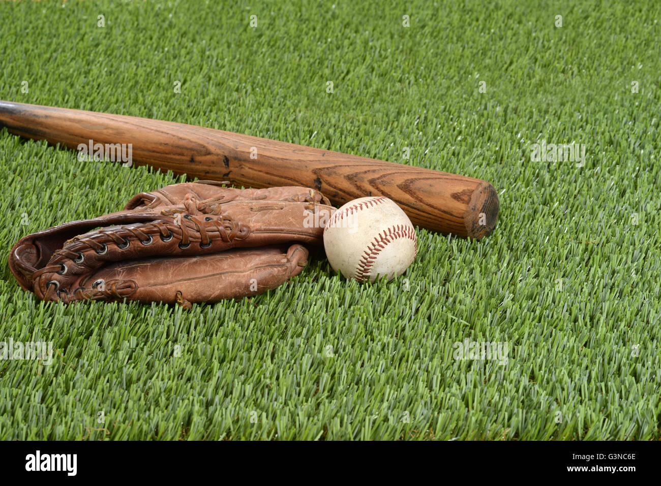 baseball with glove and bat Stock Photo Alamy