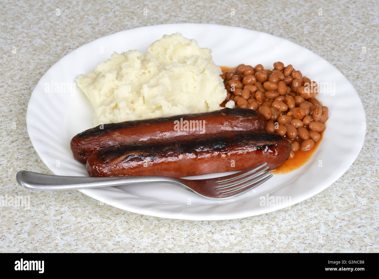 sausages with mashed potatoes and beans Stock Photo Alamy