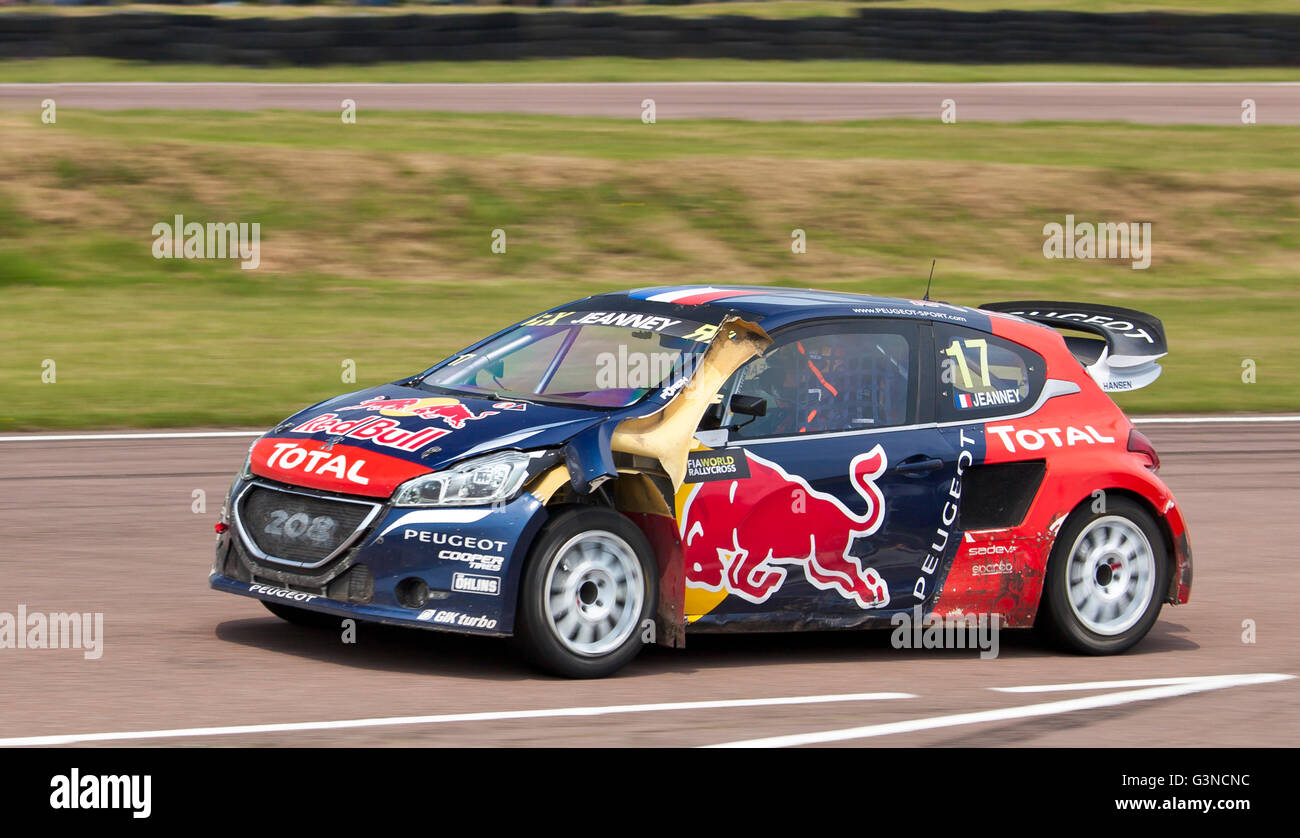World Rallycross racing, Peugeot 208 with crash damage, driven by Davy Jeanney. Stock Photo