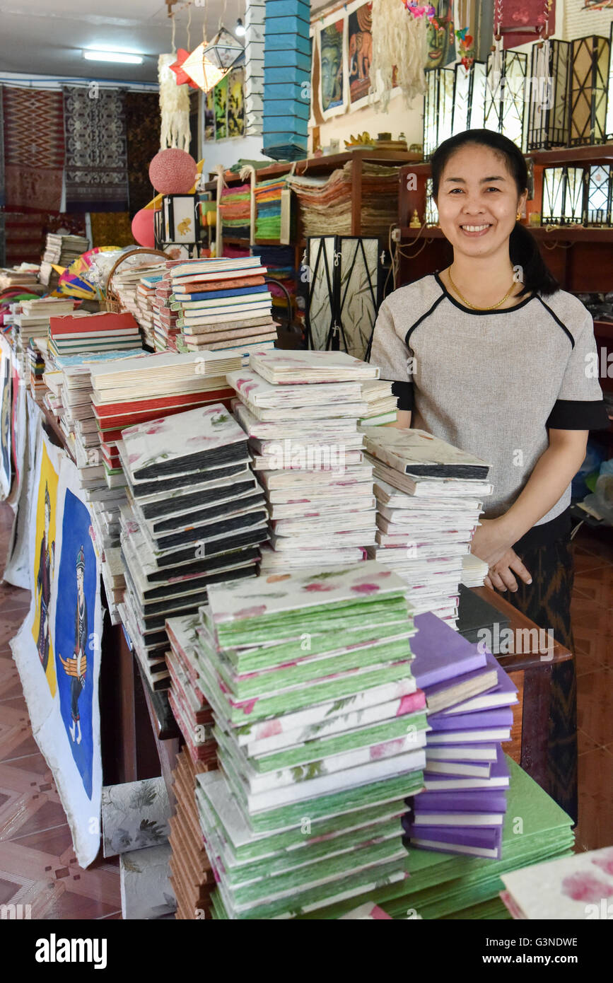 Saleslady in Xang Khong, a paper village next to Luang Prabang, Laos Stock Photo
