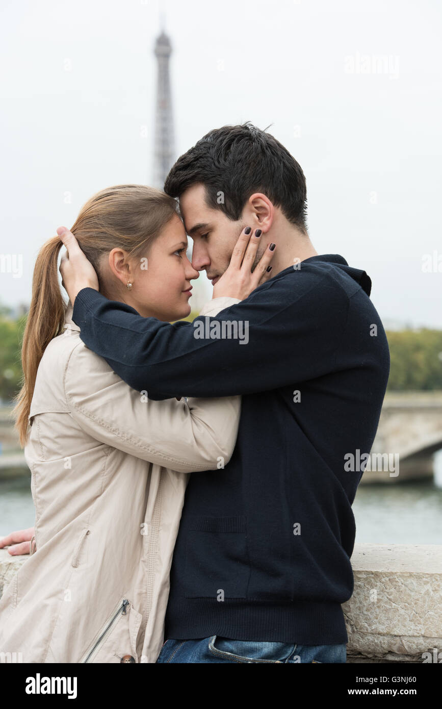 Couple kissing on love bridge hi-res stock photography and images - Alamy