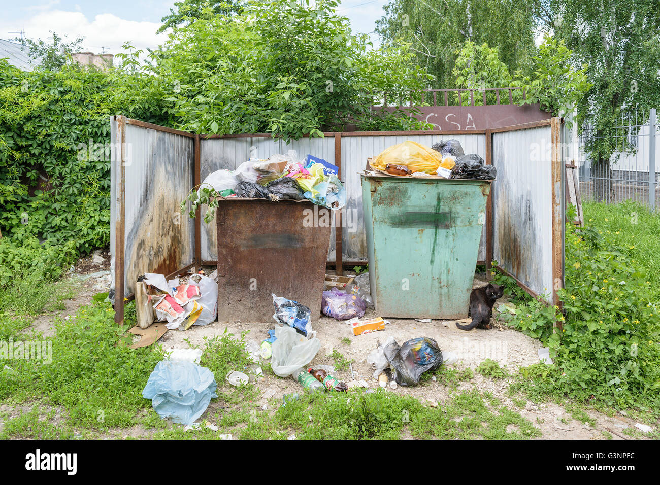 Orel, Russia - June 02, 2016: Garbage in the trash containers near the entrance to the Center for Hygiene and Epidemiology Stock Photo